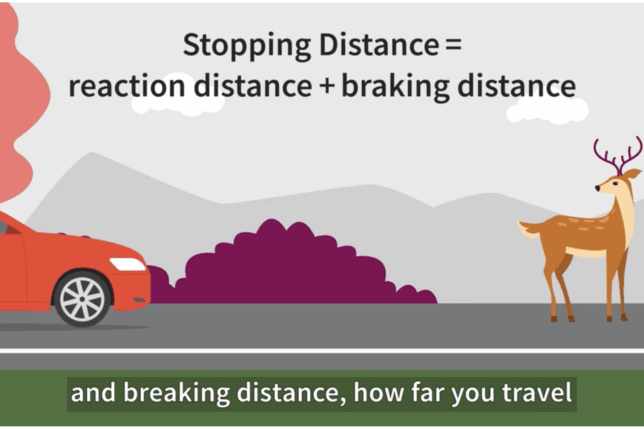 a woman standing next to a red car